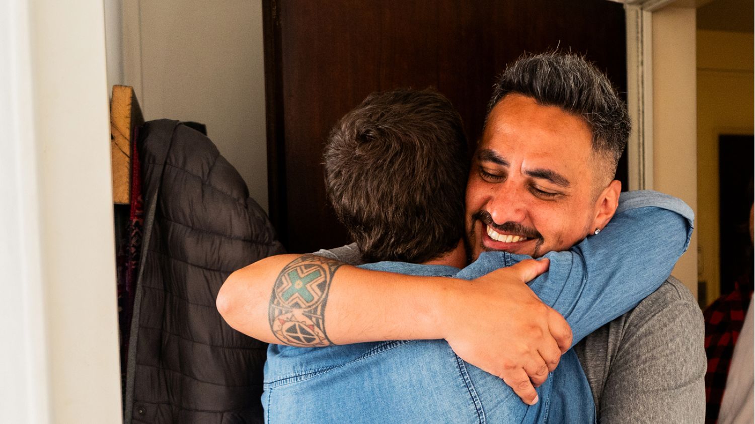 Two people embracing image